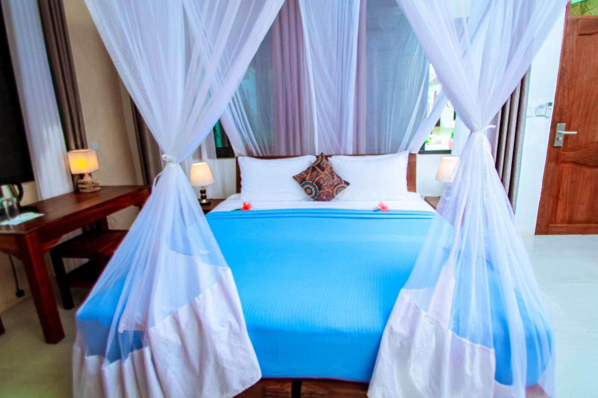 Manolo Beach Resort Уроа Екстер'єр фото